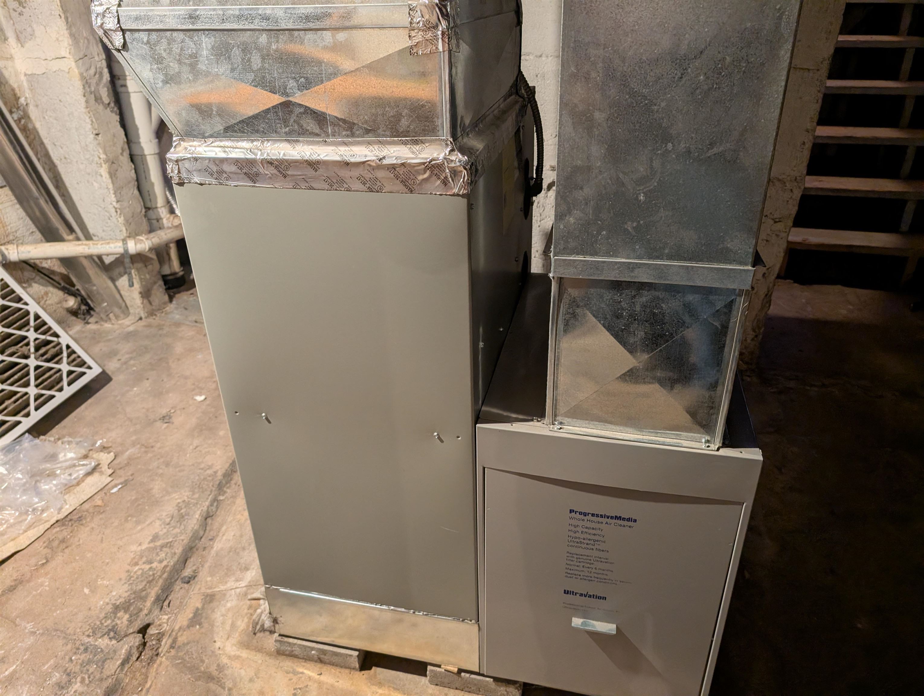 922 MacArthur Avenue Ashland, WI 54806 - Photo 12 of 20 Utility room featuring heating unit