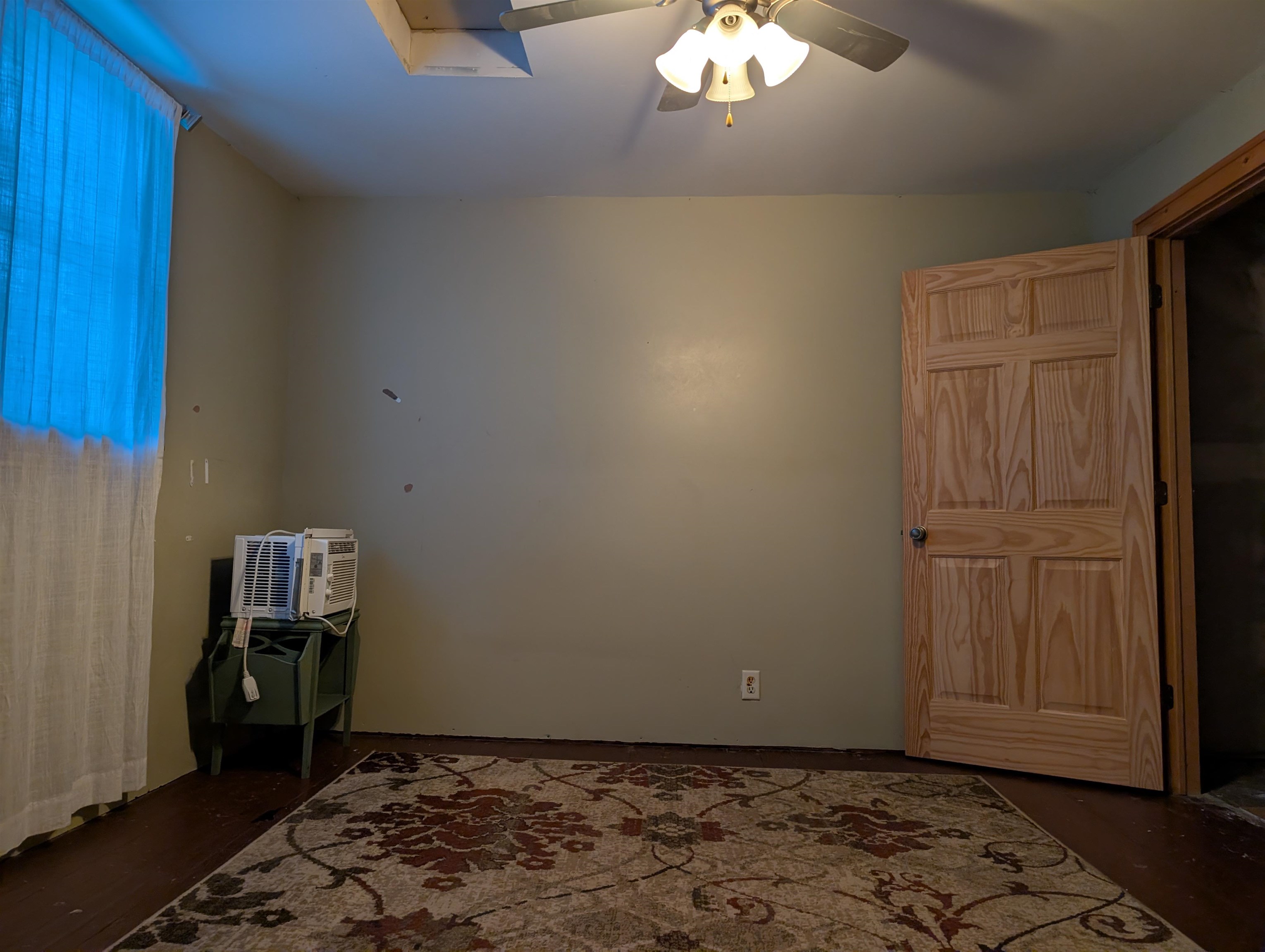 922 MacArthur Avenue Ashland, WI 54806 - Photo 16 of 20 Unfurnished bedroom featuring a ceiling fan