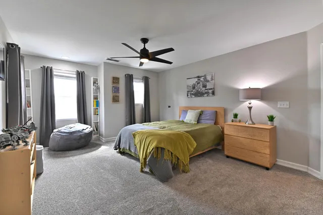a kitchen with a sink and large window