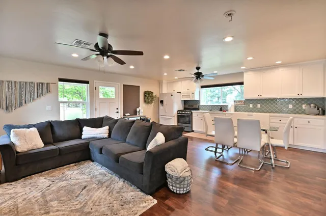 a view of a field with an ocean view