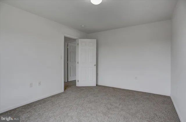 a bathroom with a shower and toilet