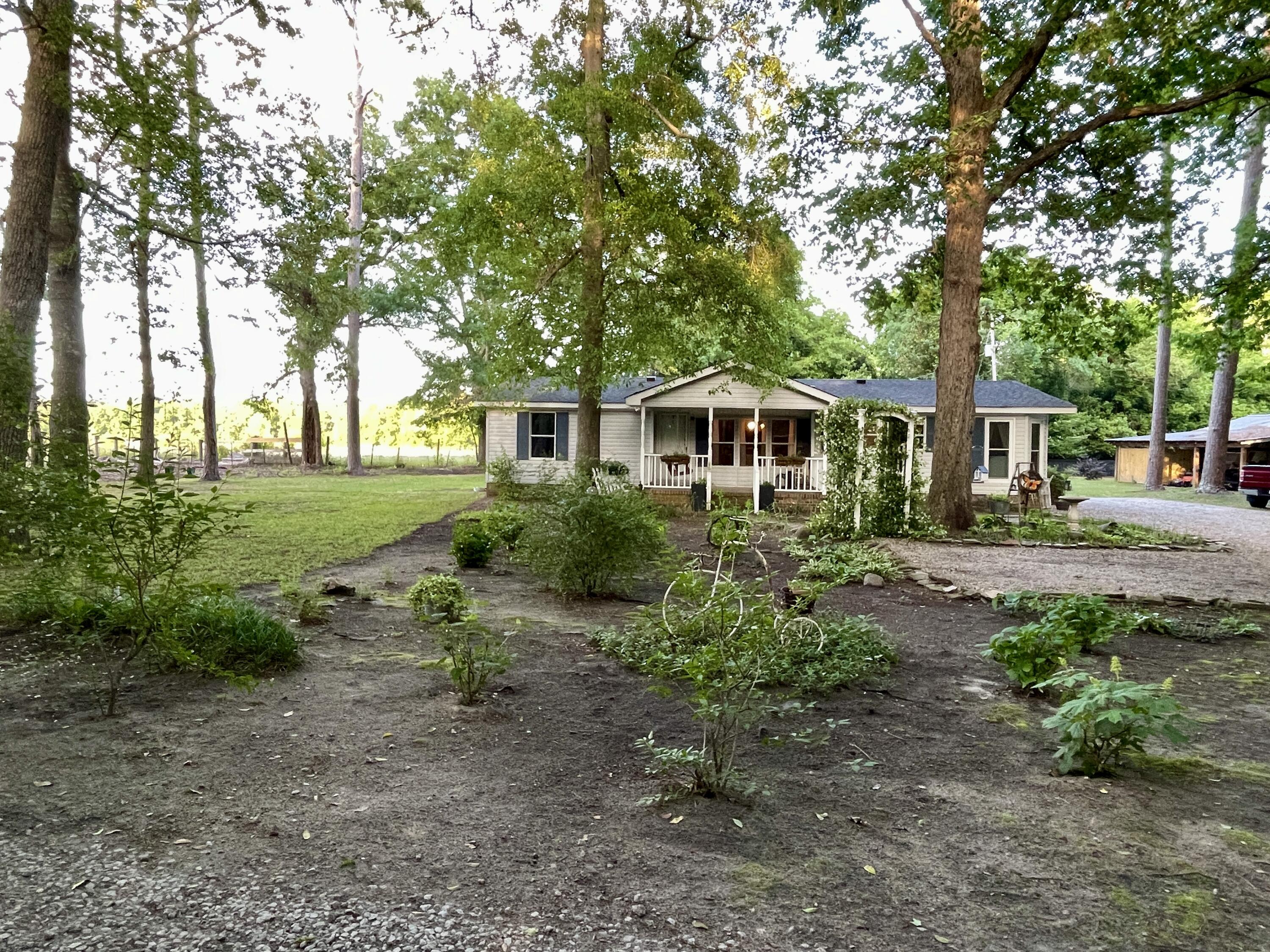 2166 Healing Springs Road Blackville, SC 29817 - Photo 28 of 43 a front view of a house with garden