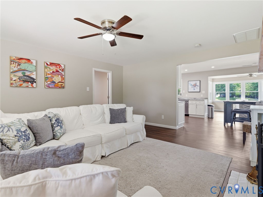 597 Harbor Drive Reedville, VA 22539 - Photo 9 of 34 Living area with a ceiling fan and light fixture,