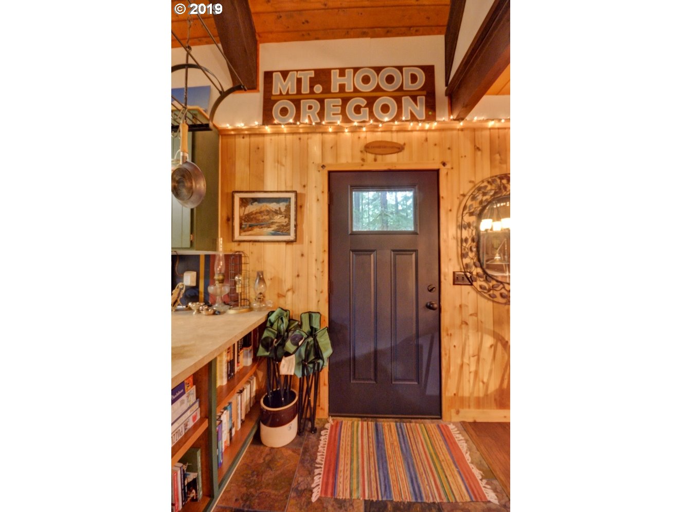75191 East E Road Rhododendron, OR 97049 - Photo 11 of 32 a view of an entryway with wooden floor