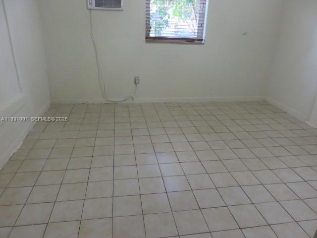 2820 Southwest 16th Terrace, Unit EFF Miami, FL 33145 - Photo 7 of 8 an empty room with white walls