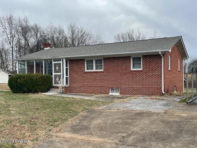 115 Barker Road Atwood, TN 38220 - Photo 1 of 16 a house that has a tree in front of it