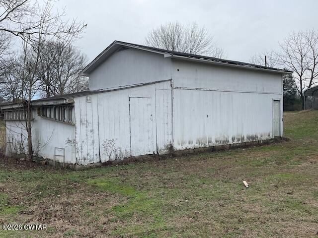 115 Barker Road Atwood, TN 38220 - Photo 6 of 16 a house with a outdoor space