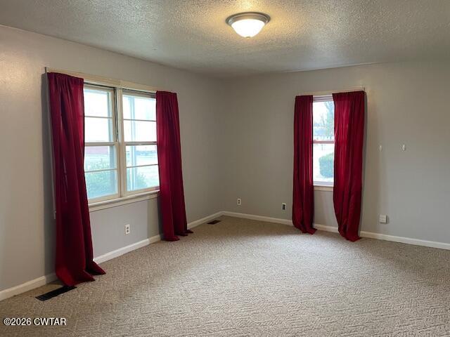 115 Barker Road Atwood, TN 38220 - Photo 8 of 16 an empty room with windows