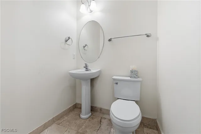 a view of outdoor space with swimming pool and furniture