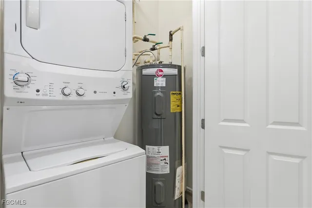 a view of swimming pool with a table and chairs