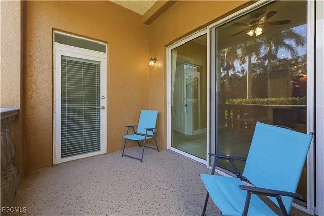 a view of a patio with swimming pool