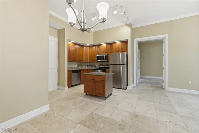 an empty room with windows and outdoor view