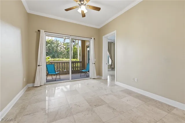 a view of a kitchen with a sink and refrigerator