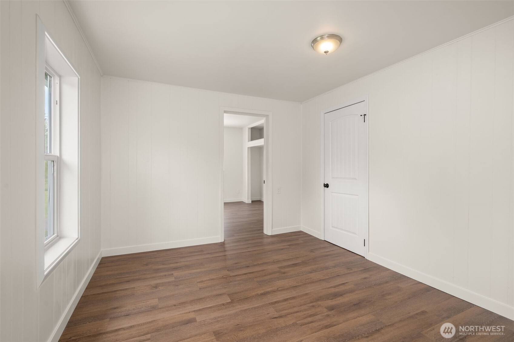 2222 Cooks Hill Road Centralia, WA 98531 - Photo 19 of 36 a view of an empty room with wooden floor and a window