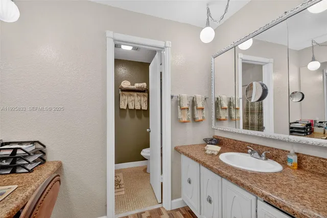 a workspace with furniture and window