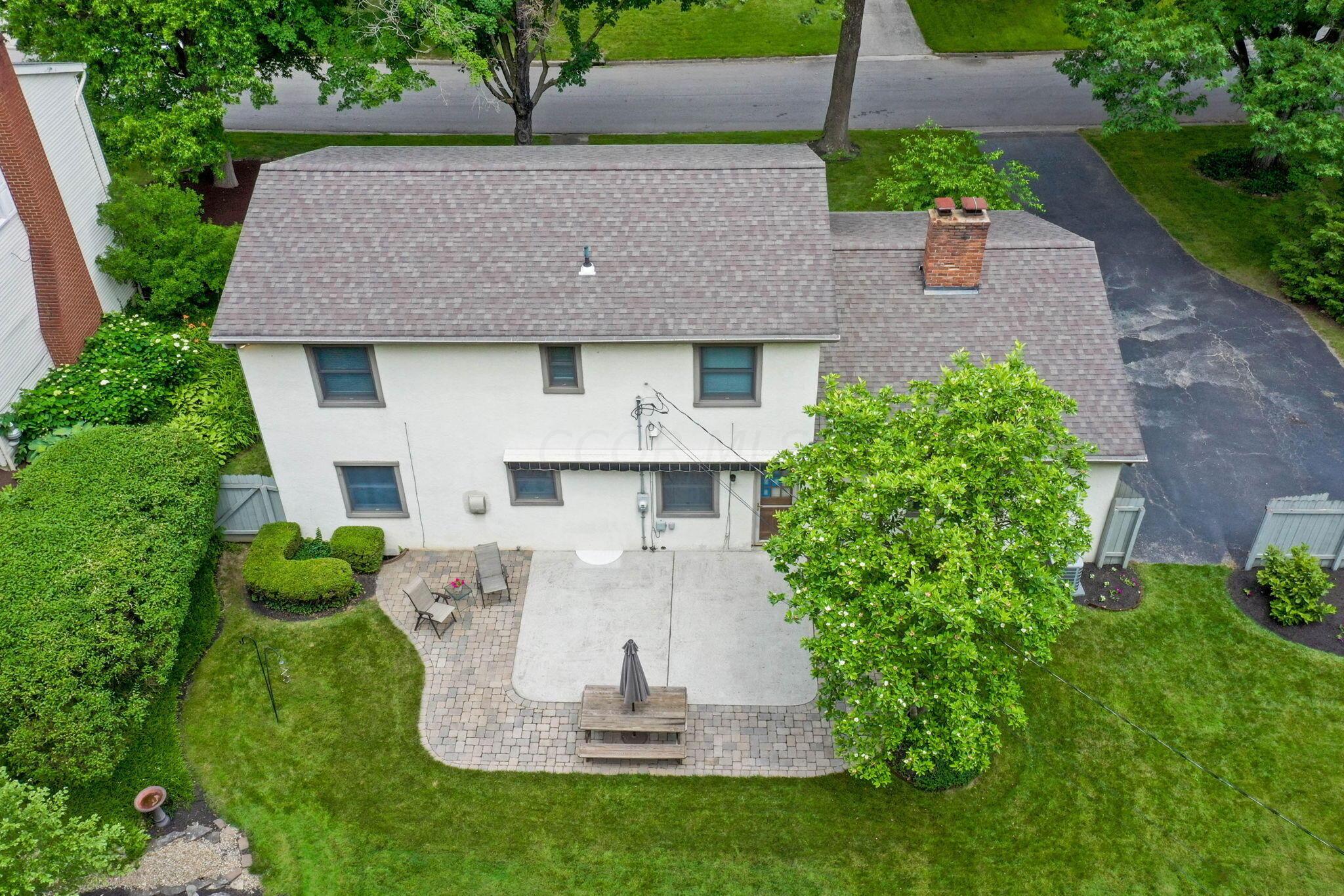 999 Birchmont Road Columbus, OH 43220 - Photo 42 of 53 Great aerial view of the back of the home and patio.
