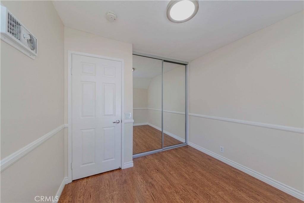 49 Meadowgrass Irvine, CA 92604 - Photo 11 of 25 a view of empty room with wooden floor
