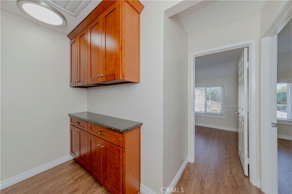 49 Meadowgrass Irvine, CA 92604 - Photo 8 of 25 a view of an entryway with wooden floor