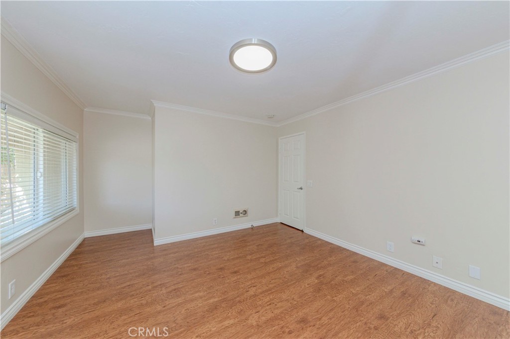 49 Meadowgrass Irvine, CA 92604 - Photo 10 of 25 wooden floor in an empty room with a window