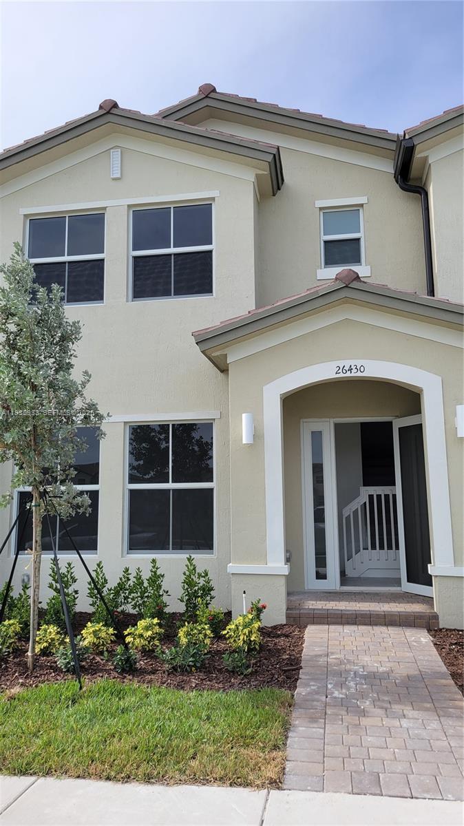26430 Southwest 148th Court, Unit 26430 Homestead, FL 33032 - Photo 2 of 21 front view of a house