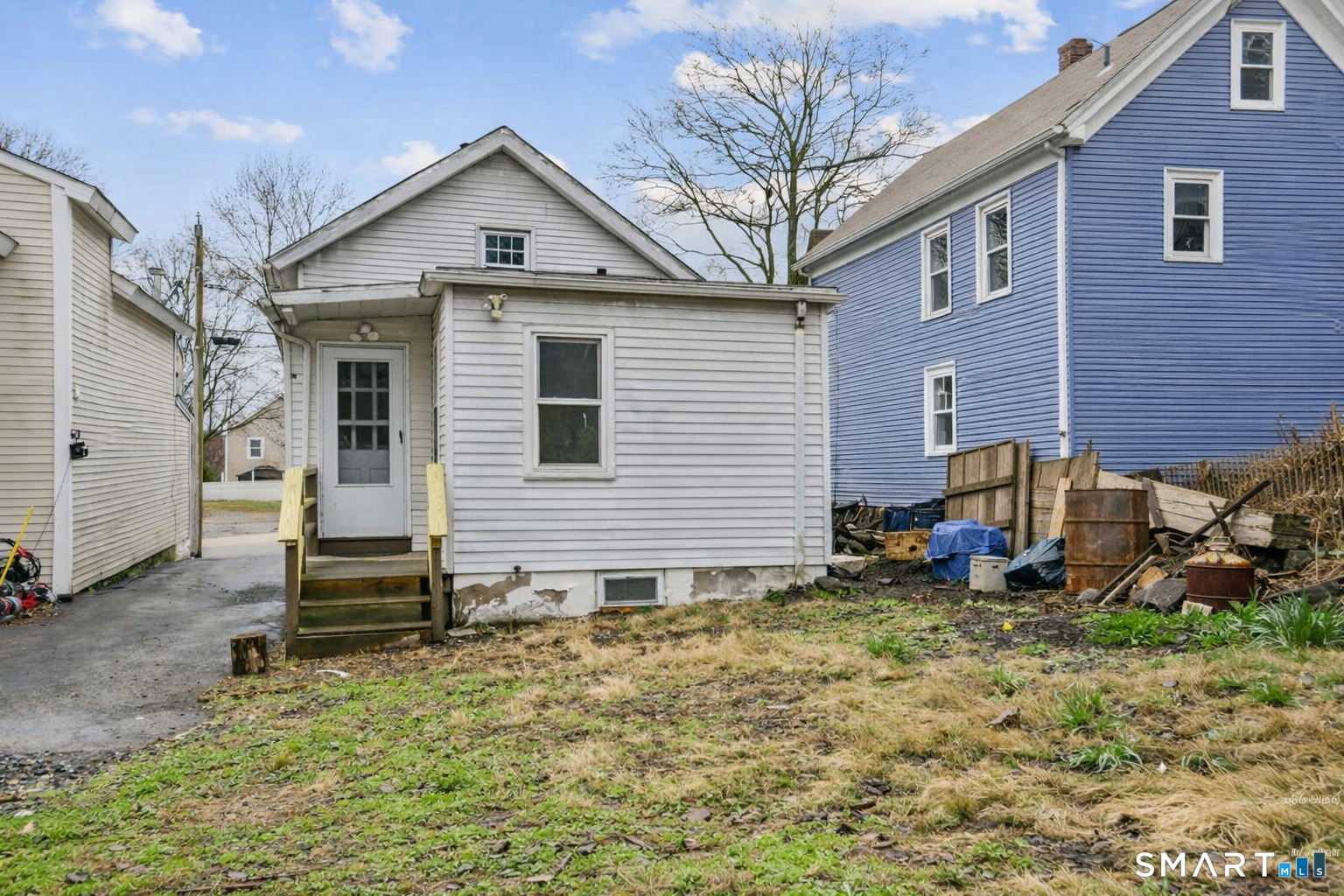 41 Fountain Street Norwich, CT 06360 - Photo 27 of 30 a view of a house with backyard and chairs