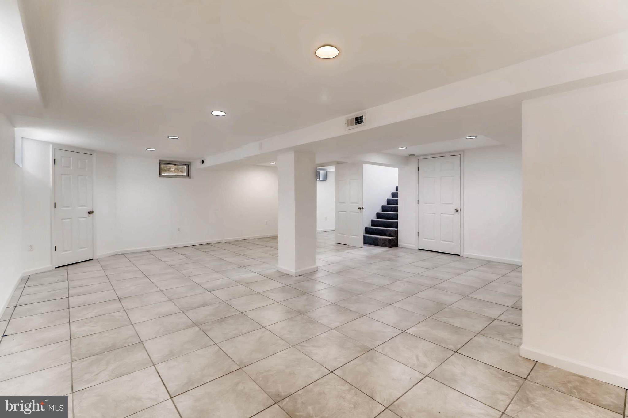 355 Upperlanding Road Baltimore, MD 21221 - Photo 14 of 17 Fully finished rec room w/ recessed lighting