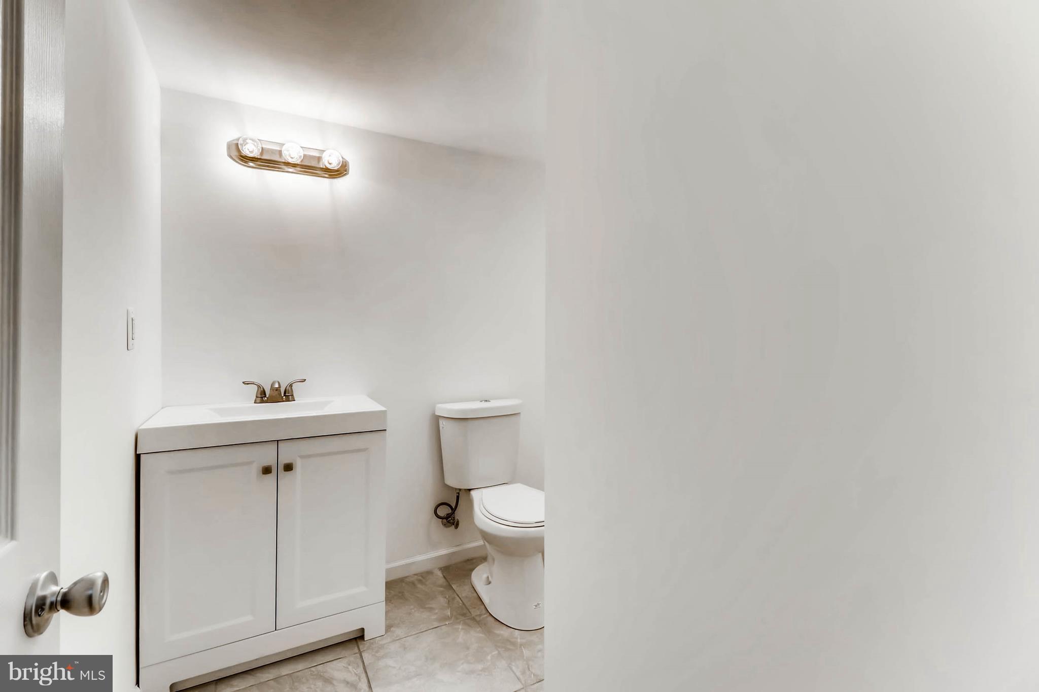 355 Upperlanding Road Baltimore, MD 21221 - Photo 15 of 17 Basement bathroom w/ standup shower