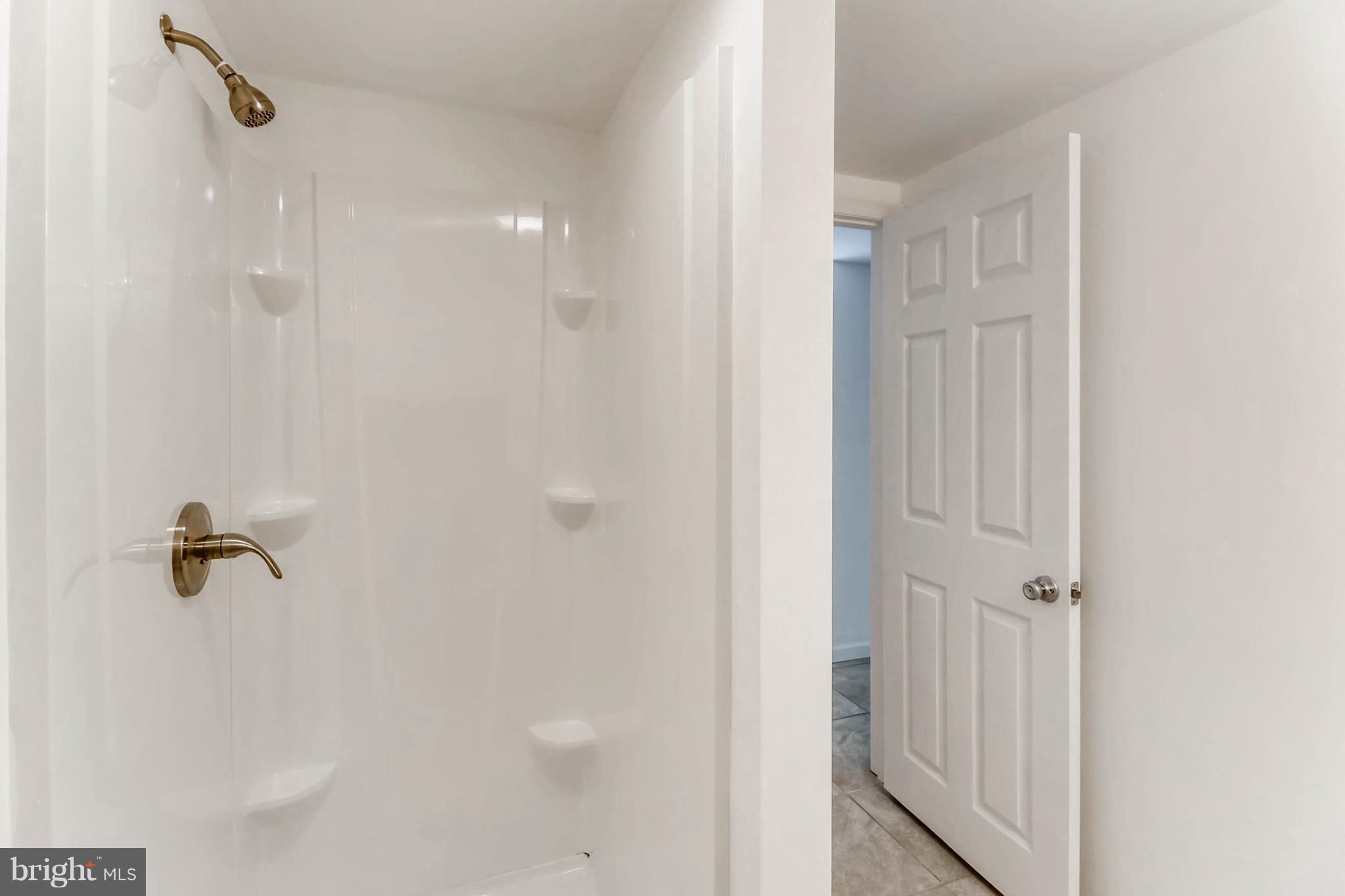 355 Upperlanding Road Baltimore, MD 21221 - Photo 16 of 17 Basement bathroom w/ standup shower