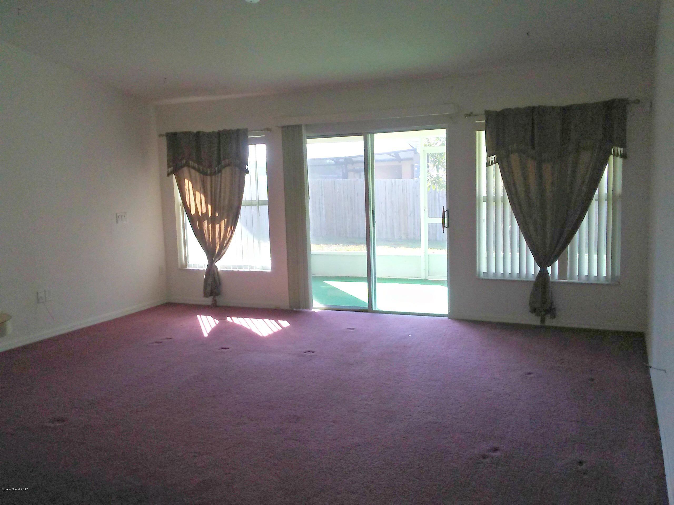 222 Benchor Road Northwest Palm Bay, FL 32907 - Photo 4 of 10 Living Room/Patio