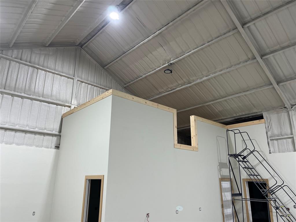 2094 Jim Harry Loop Sunset, TX 76270 - Photo 37 of 40 2,400 sq ft. spray foamed shop with storage space on top of air-conditioned room and bathroom
