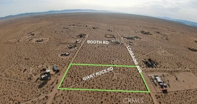 an aerial view of beach and ocean