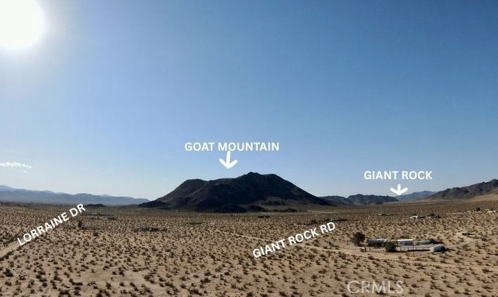 60396 Lorraine Road Landers, CA 92285 - Photo 4 of 15 a view of a sky from a yard