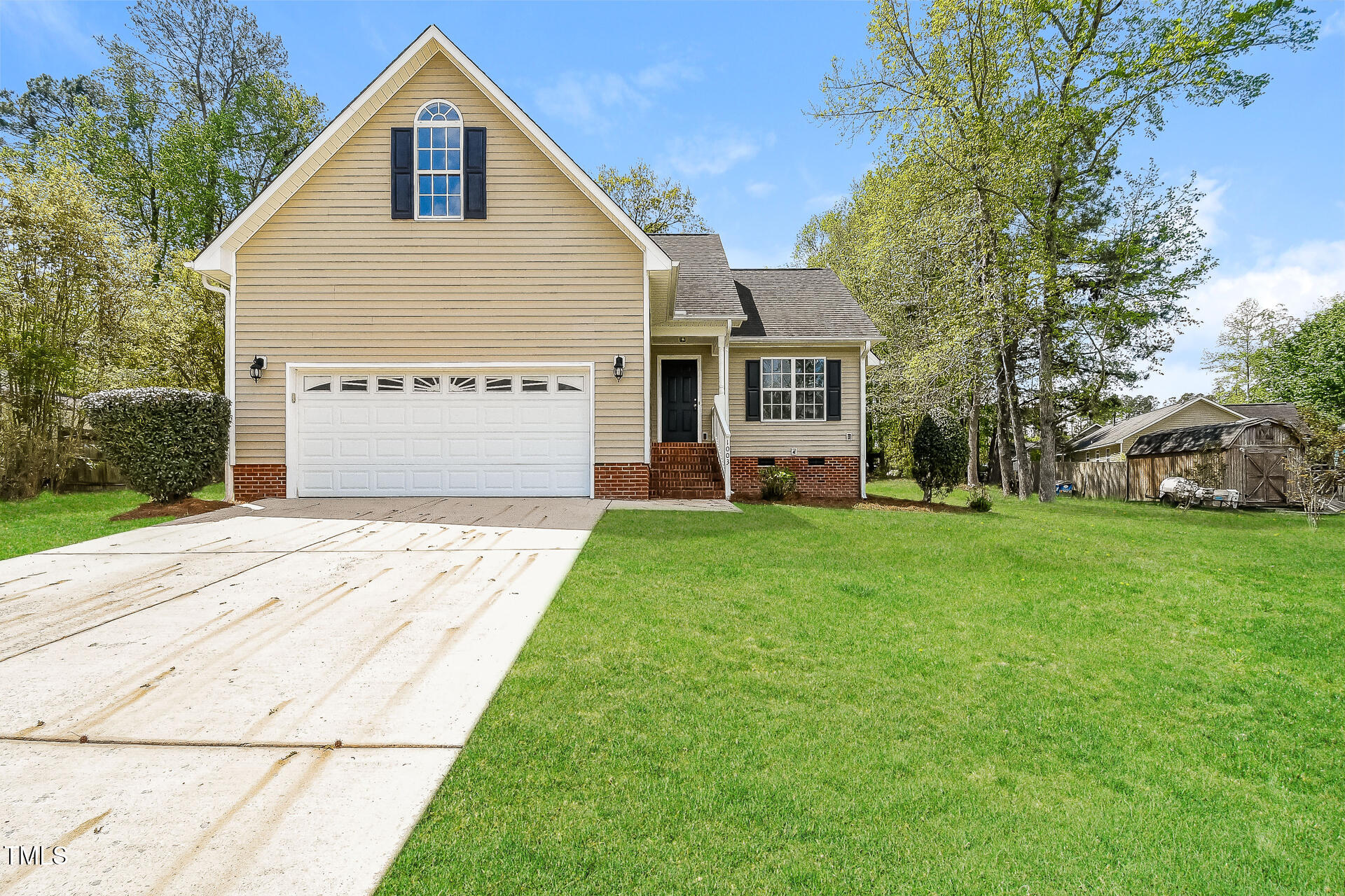 1003 Walnut Drive Erwin, NC 28339 - Photo 1 of 16 a front view of house with yard