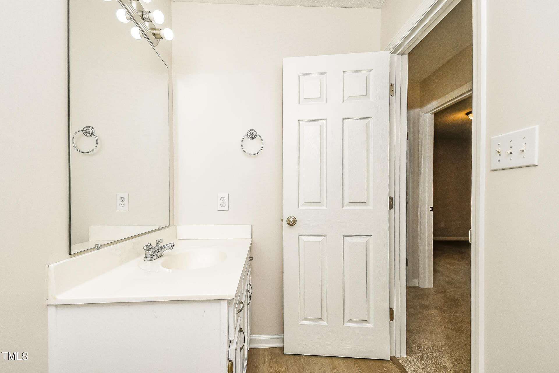 1003 Walnut Drive Erwin, NC 28339 - Photo 14 of 16 a bathroom with a sink and a mirror