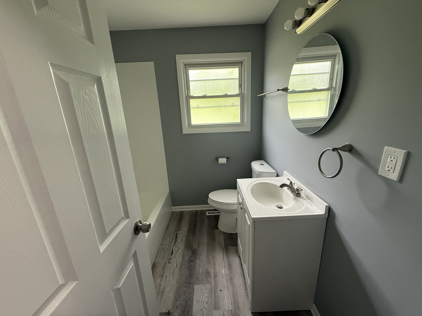 2352 West 157th Place Markham, IL 60426 - Photo 23 of 28 a bathroom with a toilet sink and mirror