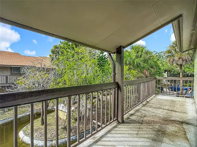 a view of balcony with deck