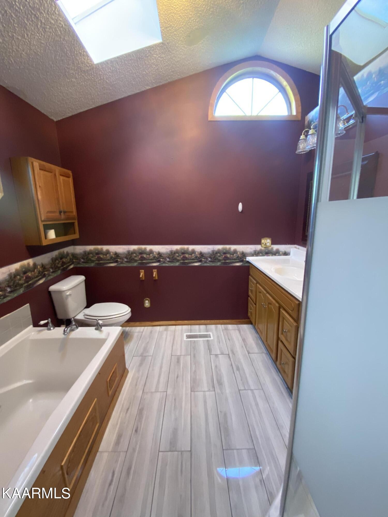 132 Dustin Lane Oneida, TN 37841 - Photo 21 of 27 a view of a kitchen with a sink and wooden floor