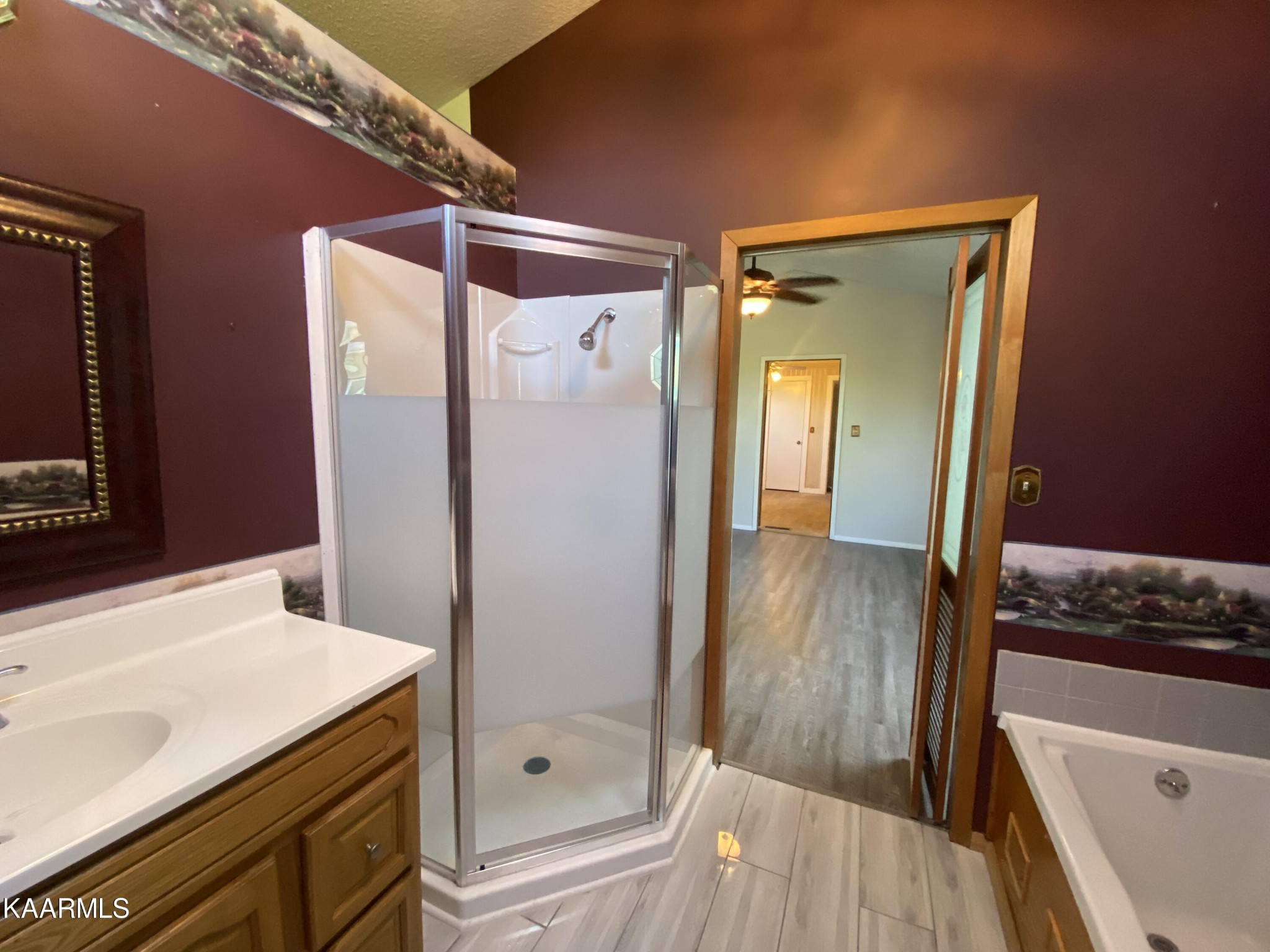 132 Dustin Lane Oneida, TN 37841 - Photo 23 of 27 a bathroom with a sink and a mirror