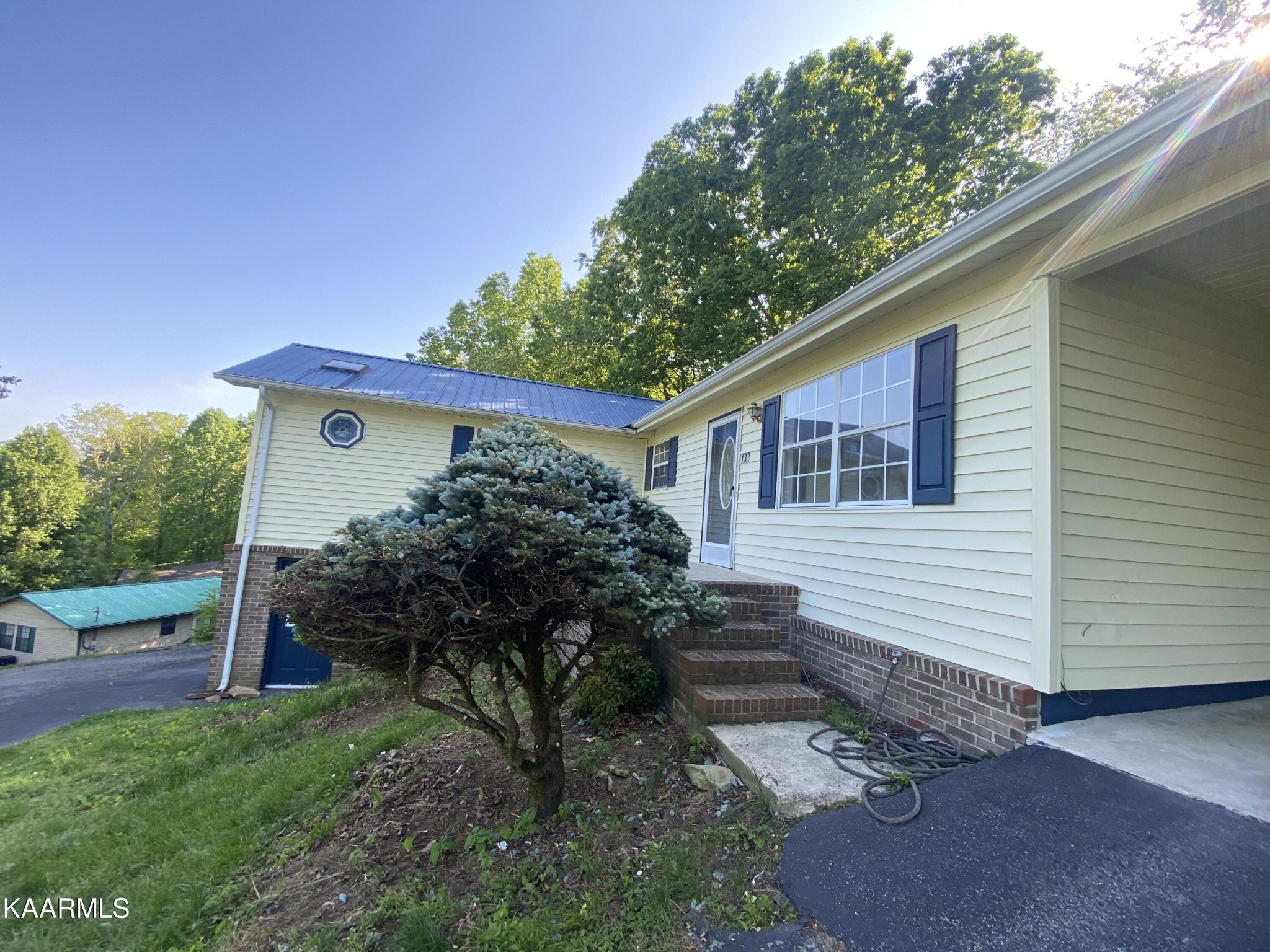 132 Dustin Lane Oneida, TN 37841 - Photo 3 of 27 a house view with a backyard space