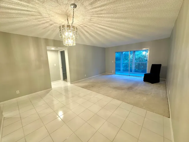 an aerial view of a house with yard swimming pool and outdoor seating
