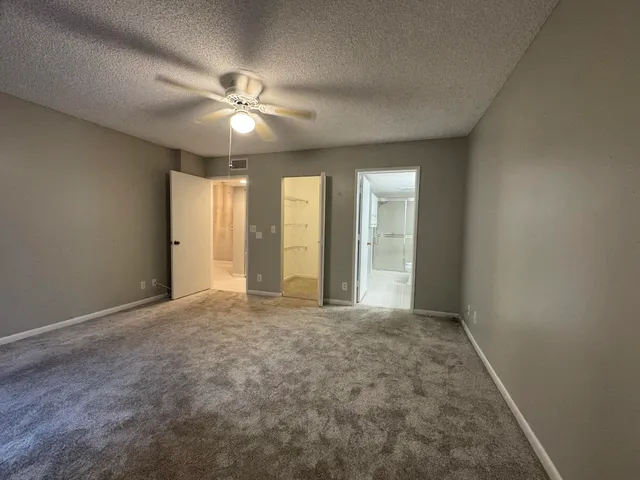 a view of a a dining room with furniture window and wooden floor