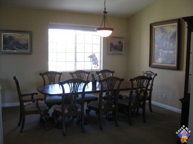 245 Raven Drive Palmdale, CA 93551 - Photo 7 of 10 a view of a dining room with furniture window and outside view
