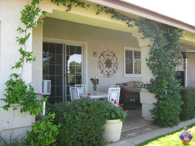 245 Raven Drive Palmdale, CA 93551 - Photo 10 of 10 a garden view with a seating space