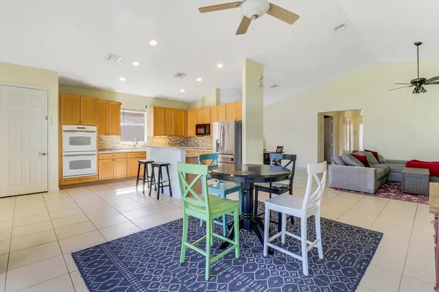 a view of a dining room with furniture