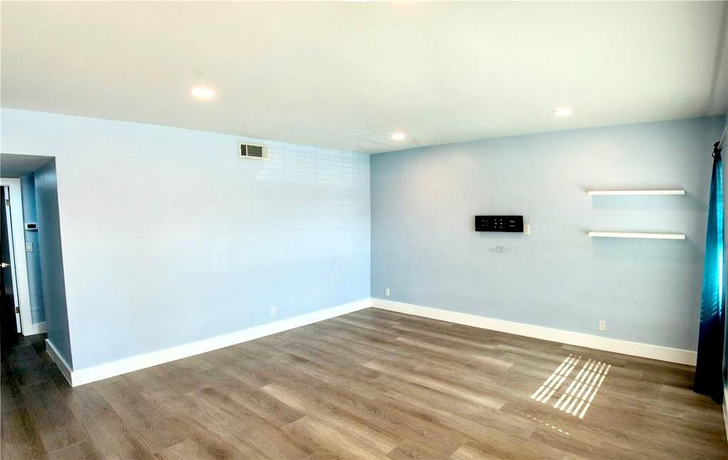 1991 Northeast 32nd Street, Unit 18 Lighthouse Point, FL 33064 - Photo 2 of 39 a view of an empty room