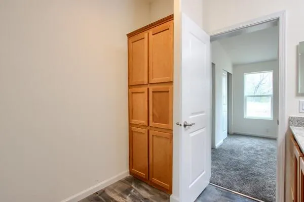 a view of entryway with wooden floor