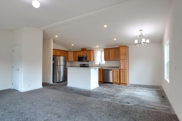 43555 Highway 41, Unit 53 Oakhurst, CA 93644 - Photo 5 of 28 a view of kitchen and refrigerator