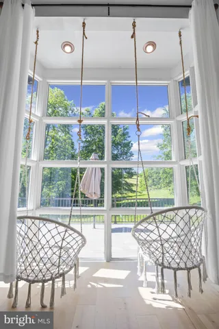 a bathroom with a sink a mirror and a shower