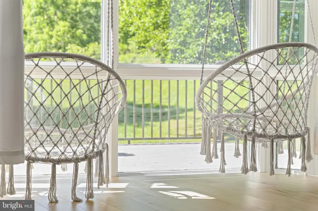 a brick building with a yard in front of it