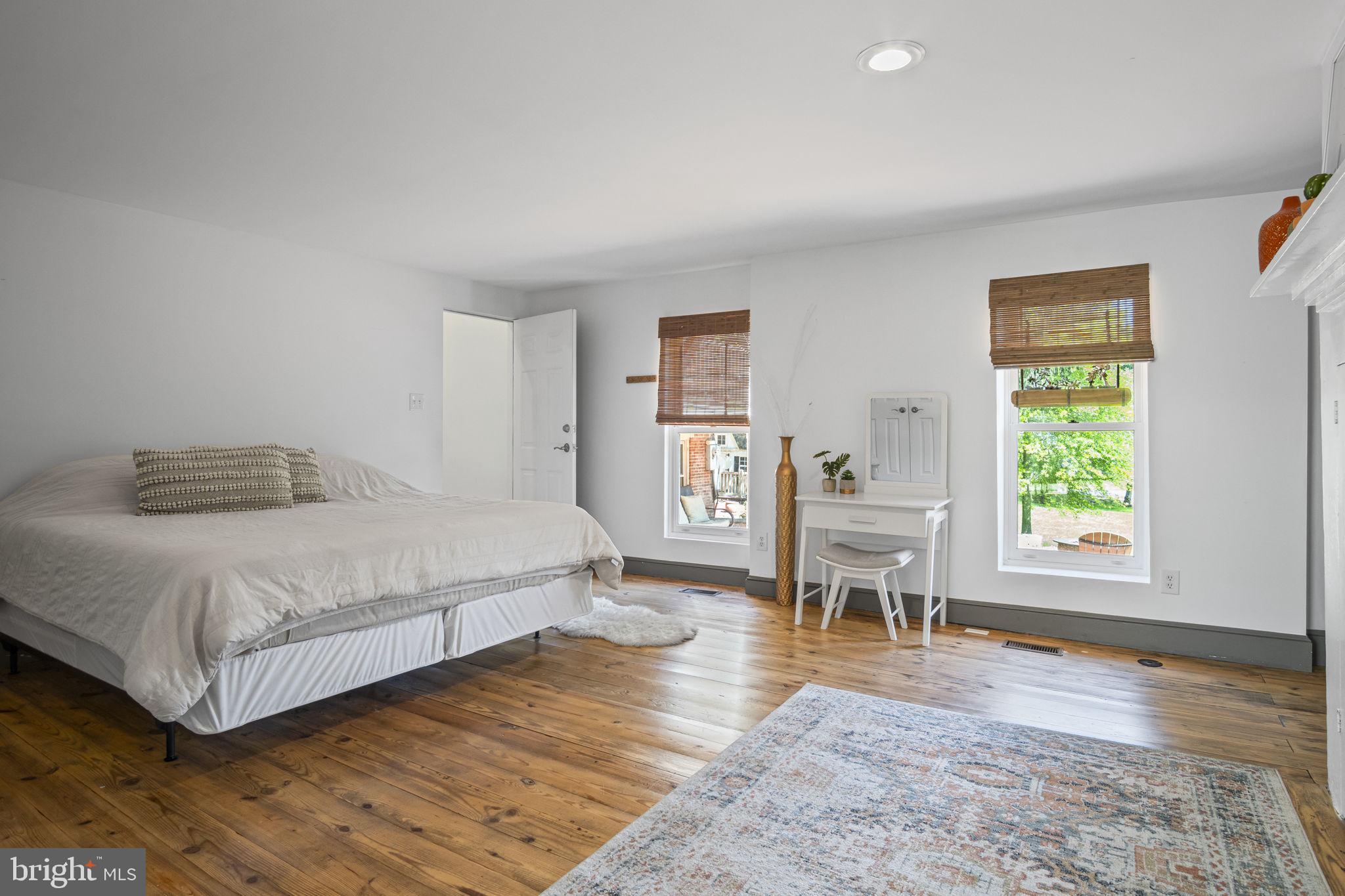 154 Calvary Church Road Wrightsville, PA 17368 - Photo 47 of 89 a bedroom with a bed and a chair in it